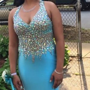 Prom dress with bedded top, zips on the side.